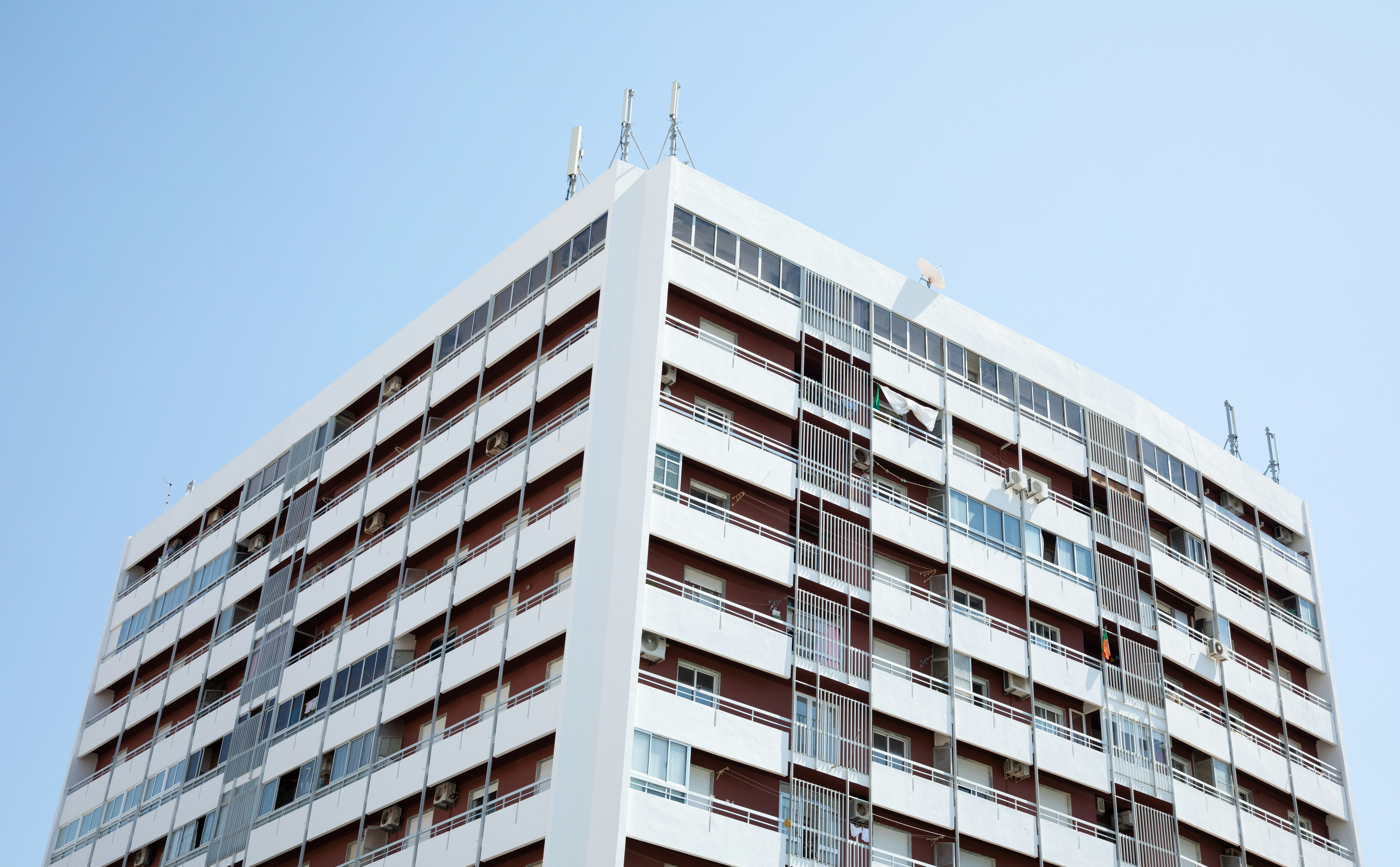 white concrete building under blue sky during daytime